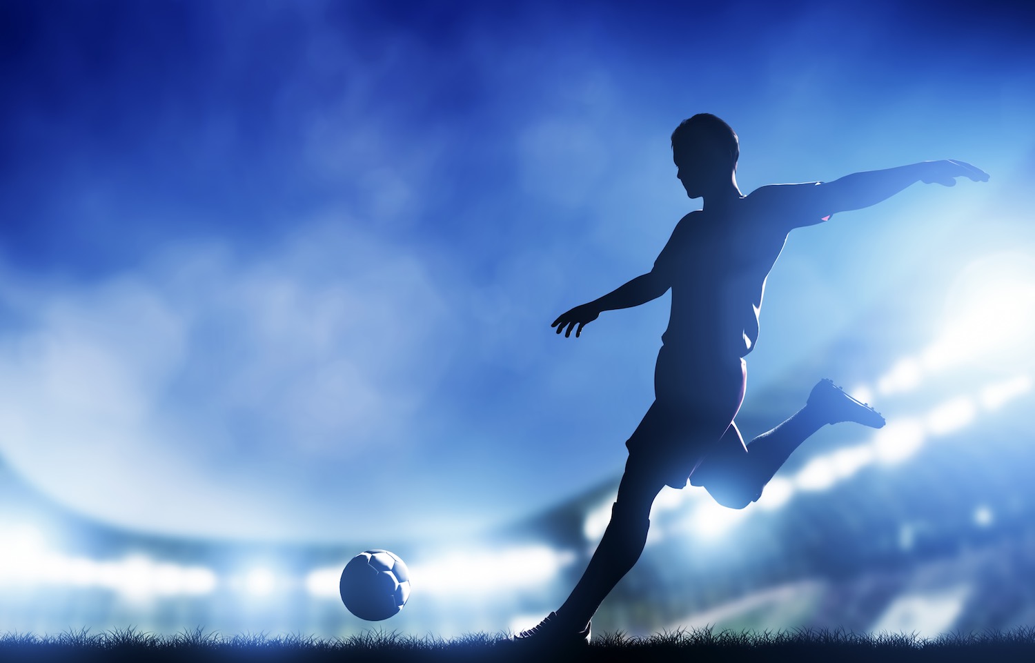 Silhouette of footballer