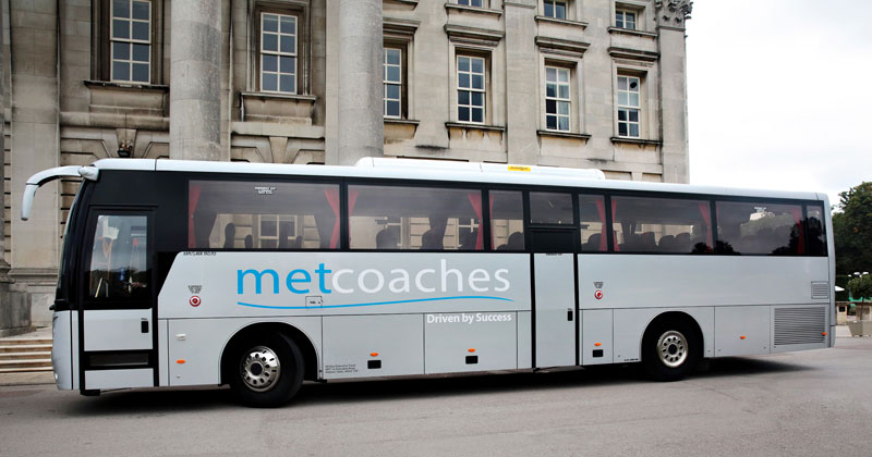 Side view of MET Coaches coach