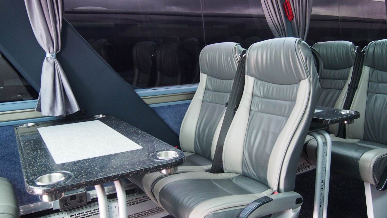 Interior of Saracens coach - with tables