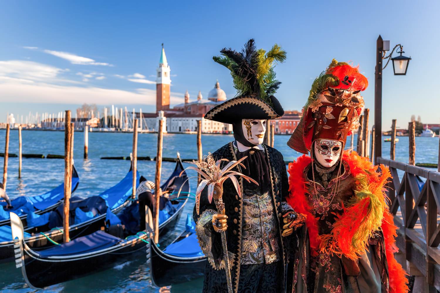 People in costume with masks at Venice Carnival