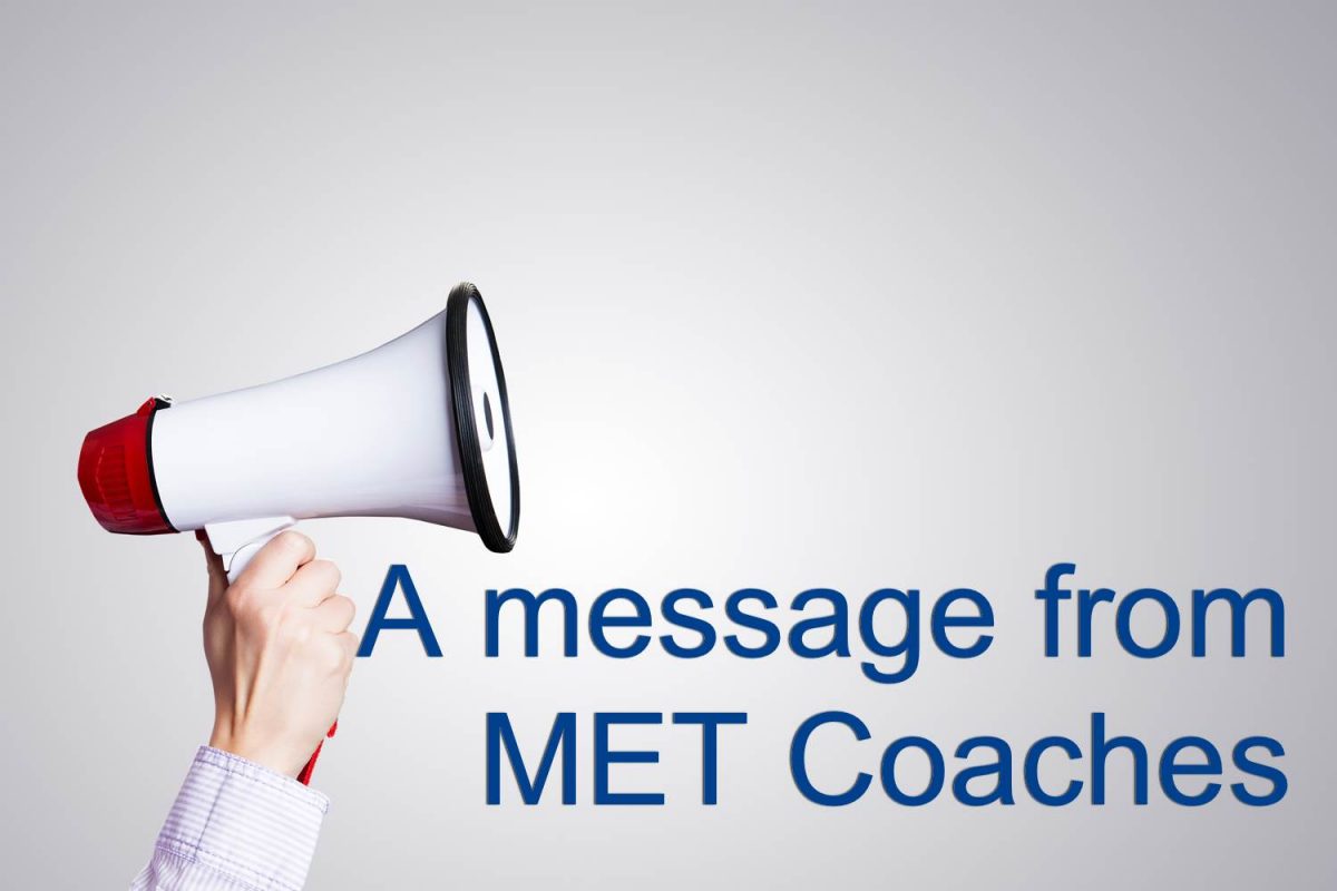 Hand holding mega phone with text saying 'a message from MET Coaches'